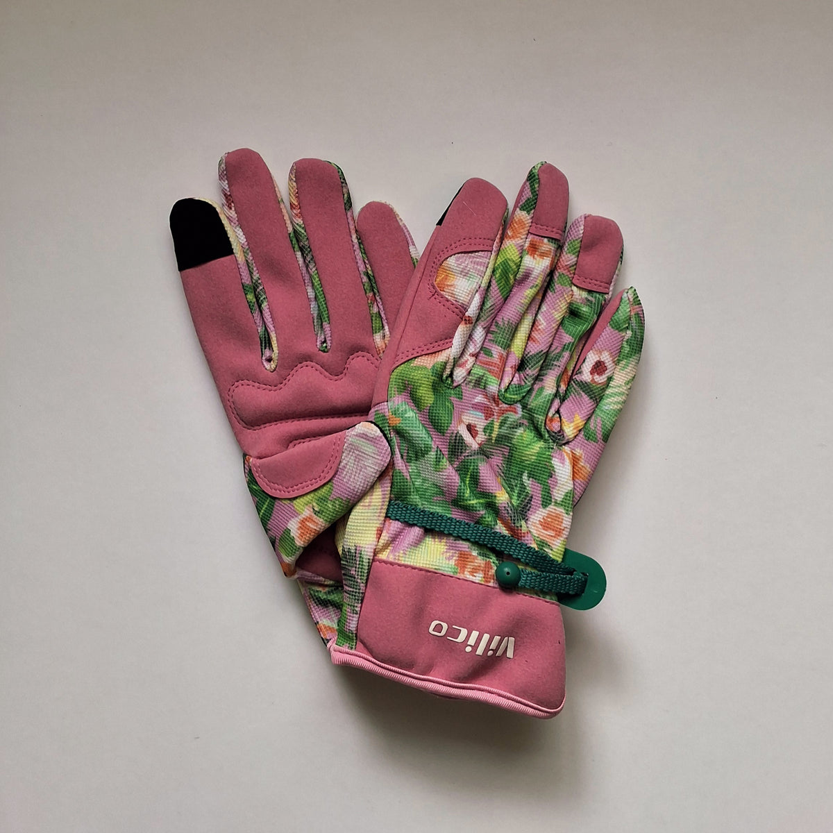 Pink floral fabric gardening gloves